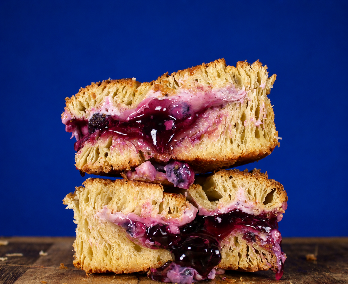 Blueberry Cheesecake filled circular croissant cross-section showing blueberry custard filling | Dough Couture
