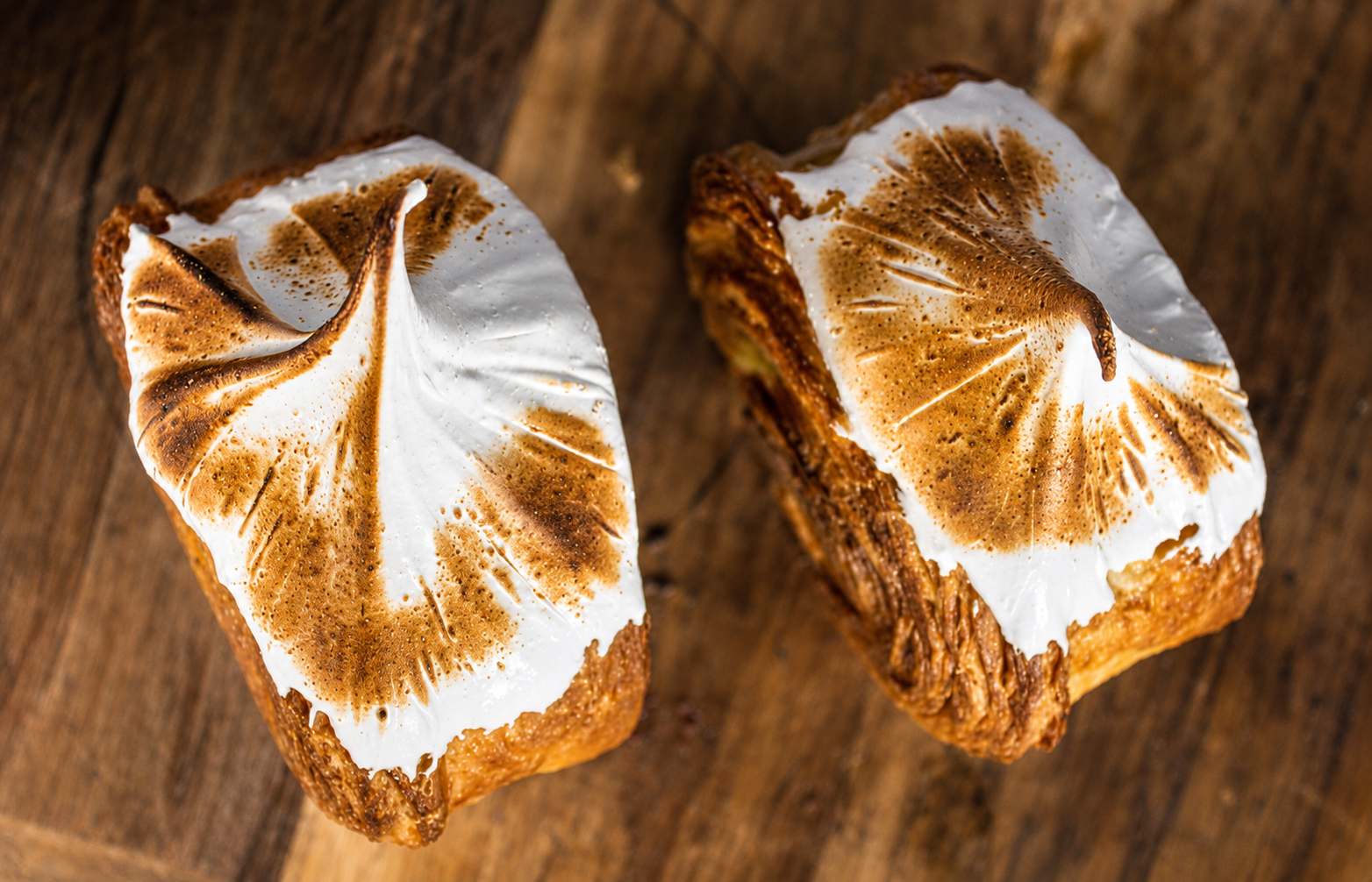 Lemon Meringue filled circular croissants with torched meringue topping | Dough Couture