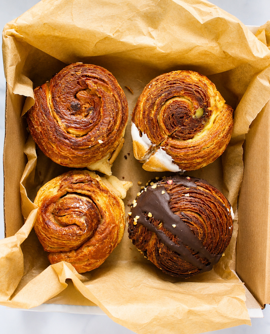 Build-Your-Own Filled Circular Croissant Box with four assorted flavours in parchment-lined box | Dough Couture